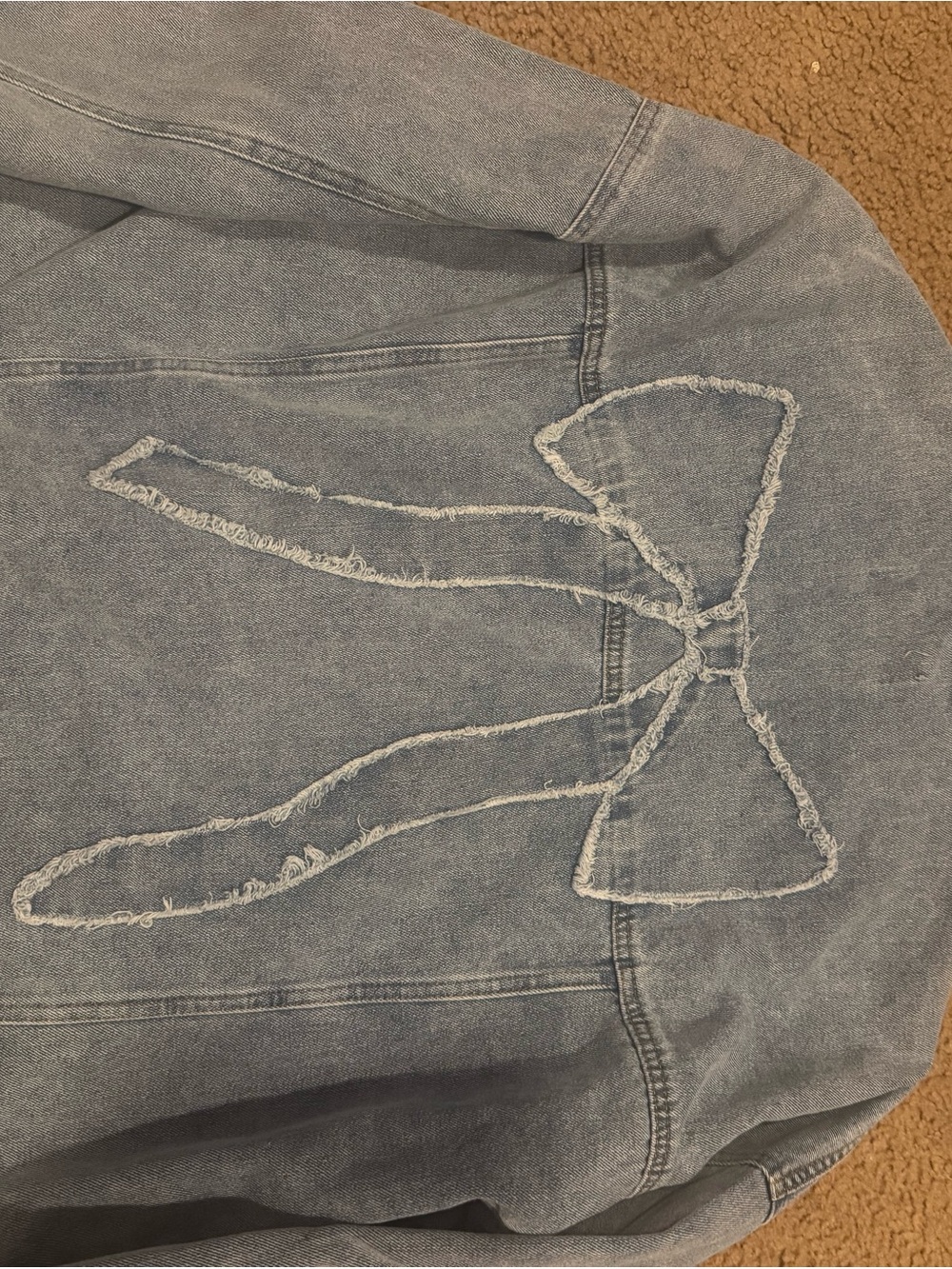 Vigoss Light Blue Denim Jacket with Frayed Bow Appliqué